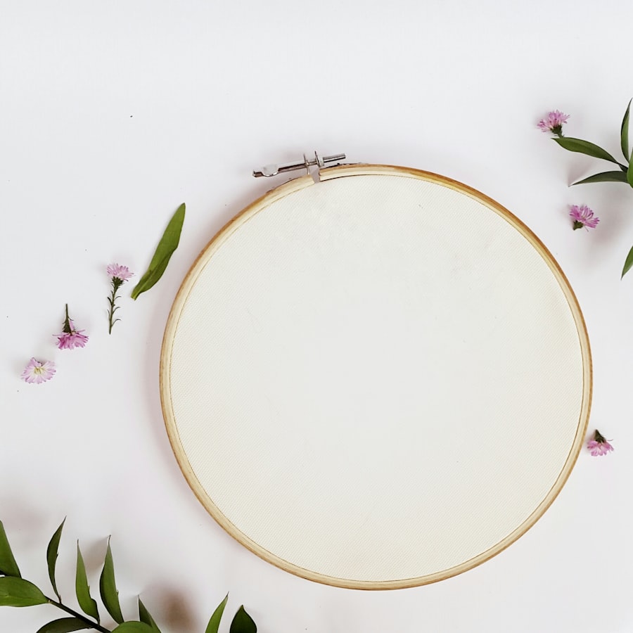 Embroidery hoop holding plain fabric — clean artwork ready for redraw
