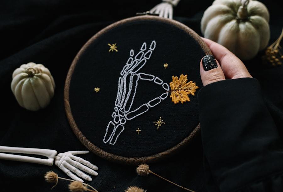 Hand-embroidered skeleton artwork in a hoop — a quirky specialty commission