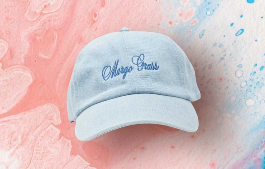 Pale-blue dad cap with navy script lettering embroidered on the front