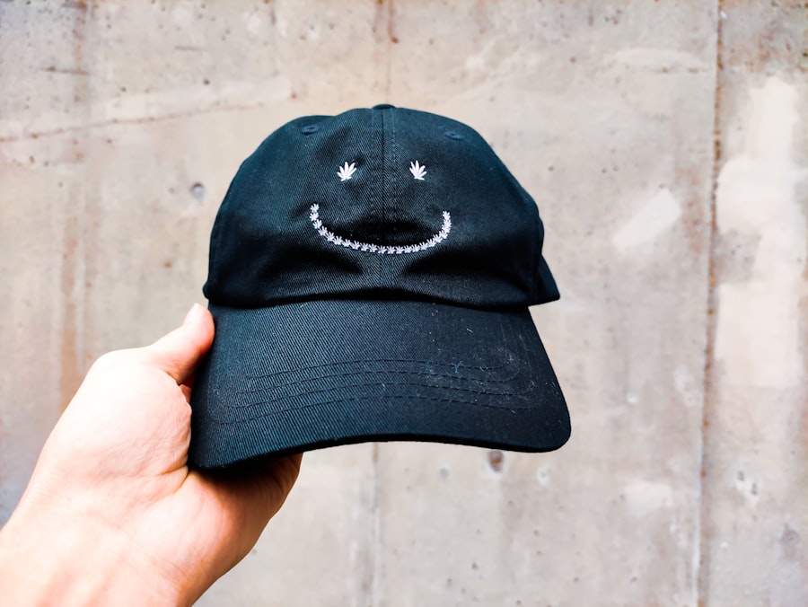 Black and white baseball cap with embroidered logo on the front panel