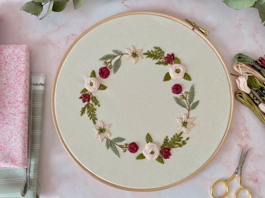 Round floral hoop embroidery in white and red threads